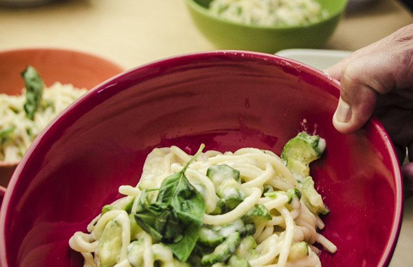 Fresh pasta in a red bowl — cooking class at The Church Naples